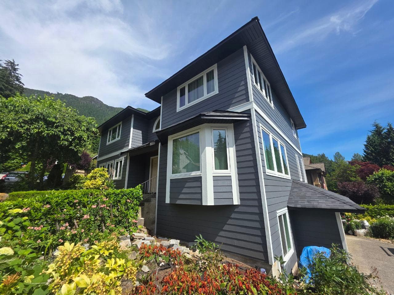 A modern home re-roofed by Dignity Roofing & Exteriors in the Lower Mainland