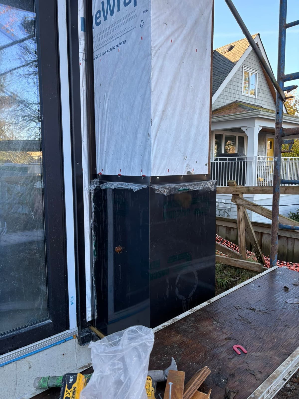 Exterior cladding installation in progress