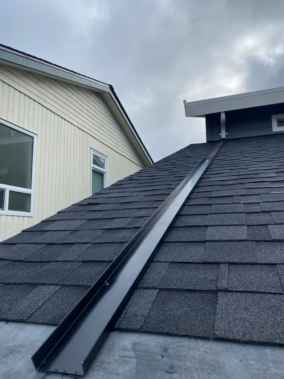 Rain channel installed to direct waterflow directly into the gutter
